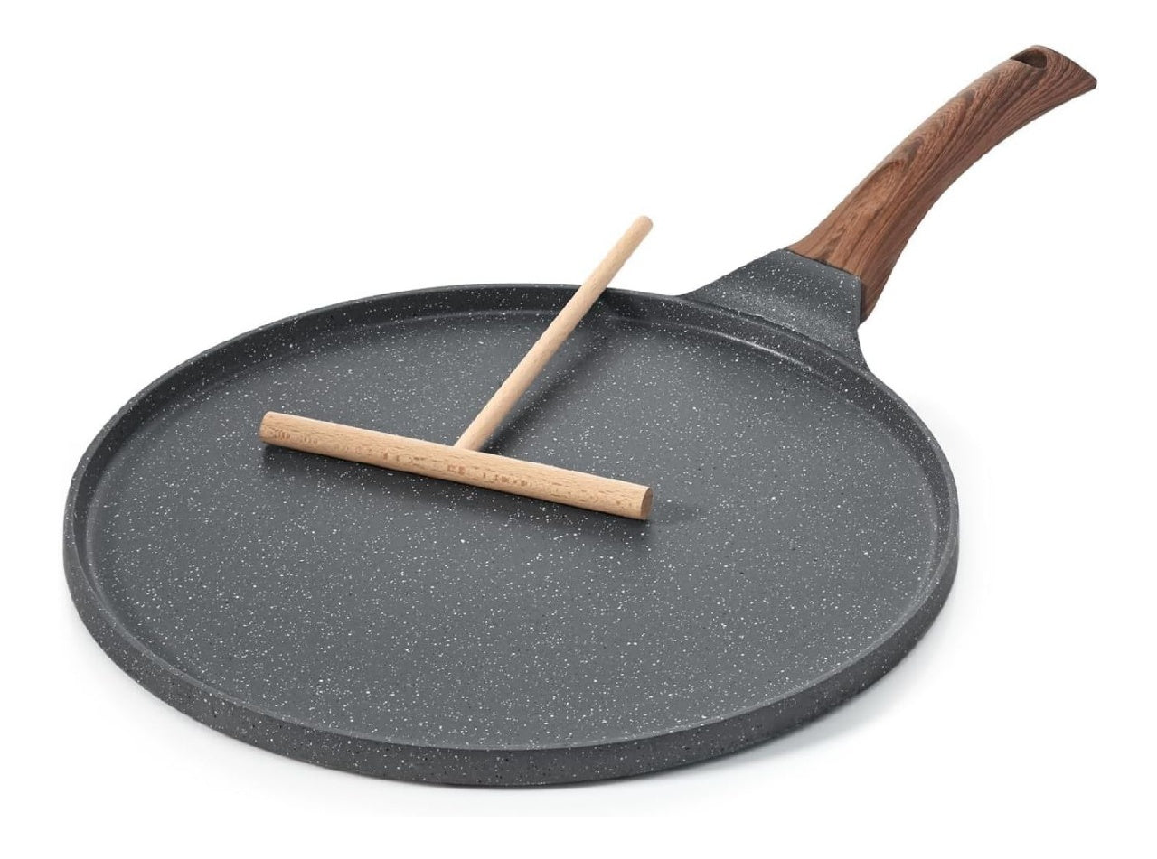 Poêle crêpes 26 cm possédant répartisseur du pâte Revêtement antiadhésif dans granit suisse compatible tous feux induction poignée ergonomique simple à nettoyer